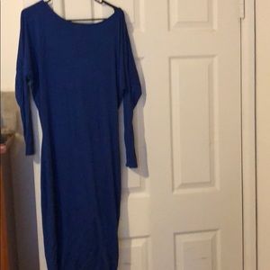 Blue dress and it’s off the shoulder.
